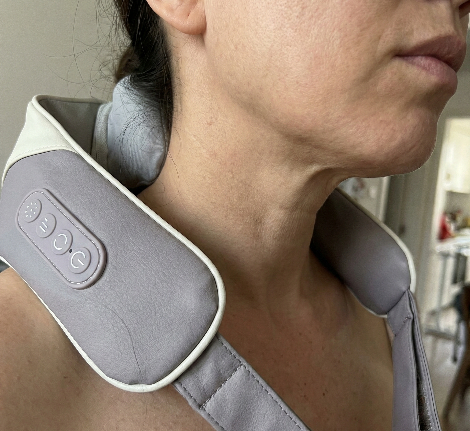 Hands-free electric neck and shoulder massager for deep tissue trigger point therapy.